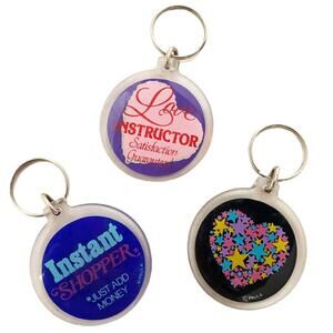 3 vintage keychains. both sides are the same